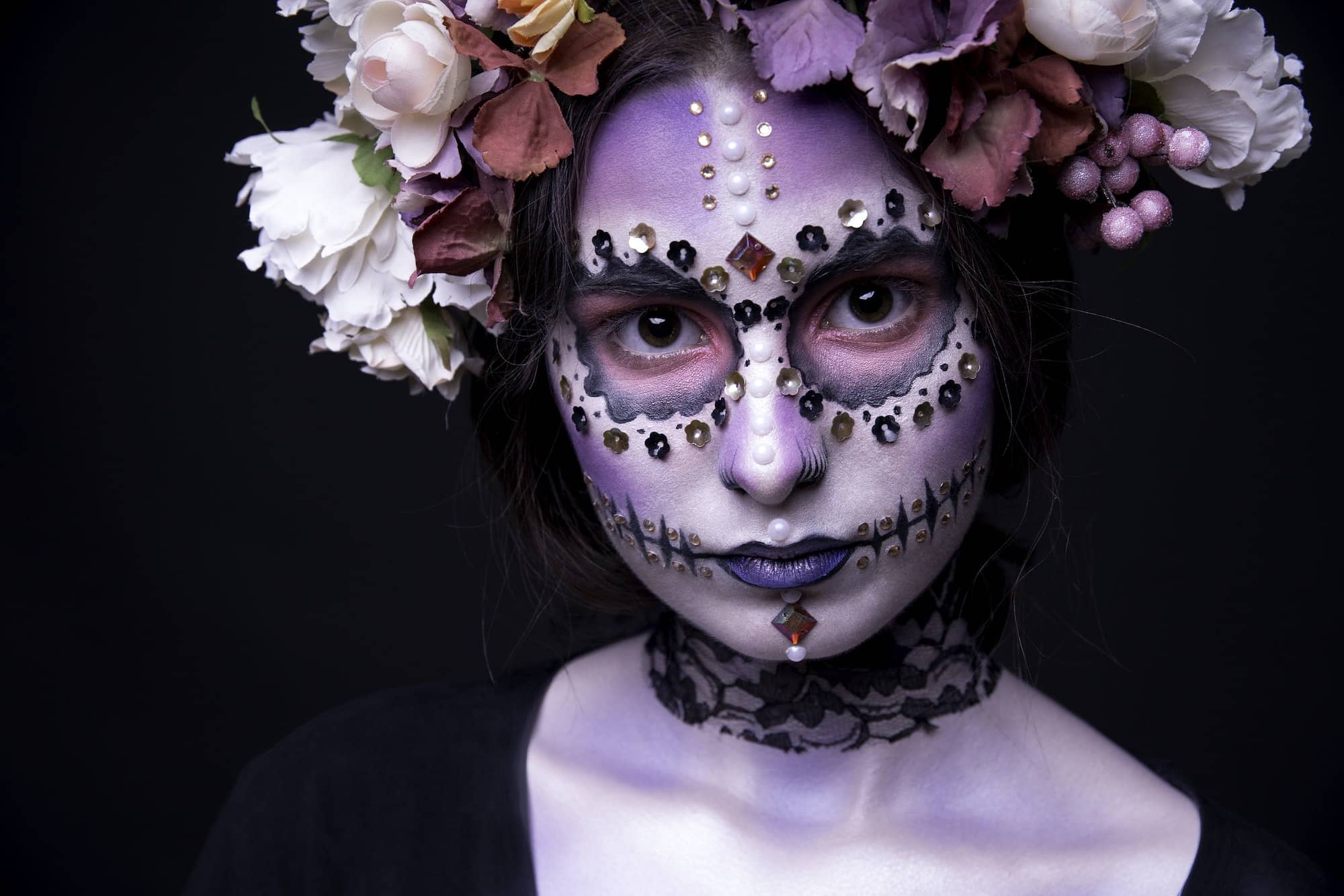 Halloween Model close-up with Rhinestones and Wreath of Flowers